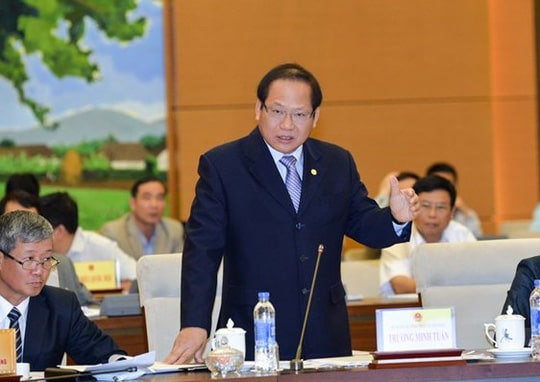 Bộ trưởng Bộ Thông tin và Truyền thông Trương Minh Tuấn trả lời chất vấn chiều 18-4 - Ảnh: Quochoi
