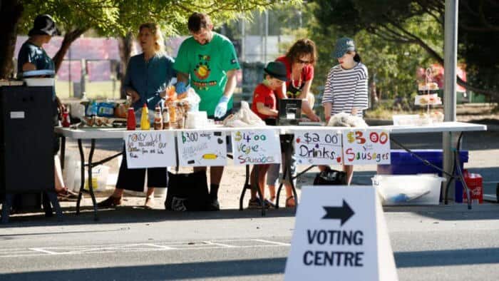 Election day in Australia is accompanied by cake stalls and sausage sizzles to raise funds for schools and other community groups.