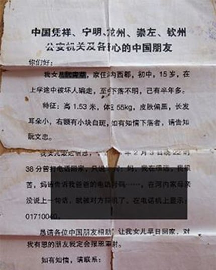 Đơn ông Thắng nhờ cô giáo tiếng Trung viết hộ để gửi các cơ quan Trung Quốc nhờ tìm con. Ảnh: H.Hiền.