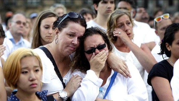 5 gia đình nạn nhân vụ MH17 dàn xếp kín với Malaysia Airlines - Ảnh 1.