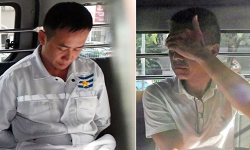 Dang Van Hanh (trái) và nghi phạm Singapore Richard Goh Chee Keong khi bị buộc tội vào năm ngoái. Ảnh: Straits Times