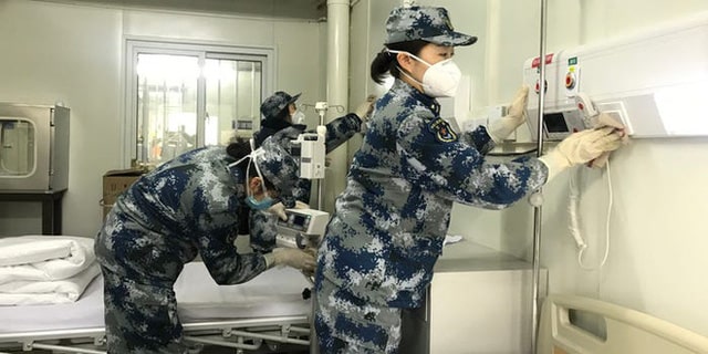  Báo chí phương Tây nghi ngờ hiệu suất thực sự của 2 bệnh viện dã chiến chống corona ở Trung Quốc - Ảnh 5.