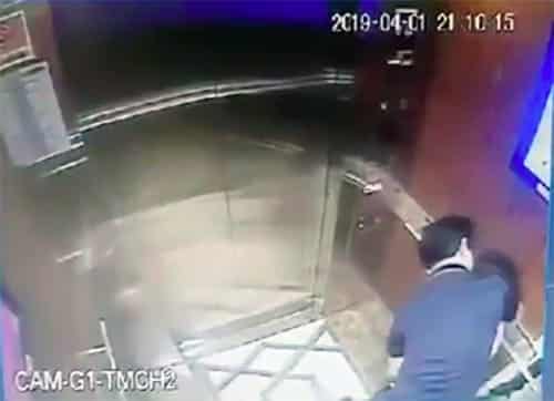 Bé gái bị ông Linh ôm ghì trong thang máy.