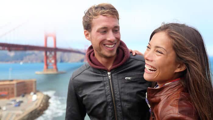 Happy young couple laughing, San Francisco