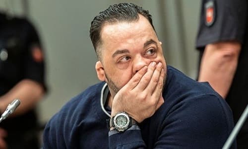 Former nurse Niels Hoegel, left, accused of multiple murder and attempted murder of patients, attends a session of the district court in Oldenburg, Germany, Wednesday, June 5, 2019. (Mohssen Assanimoghaddam/dpa via AP, Pool