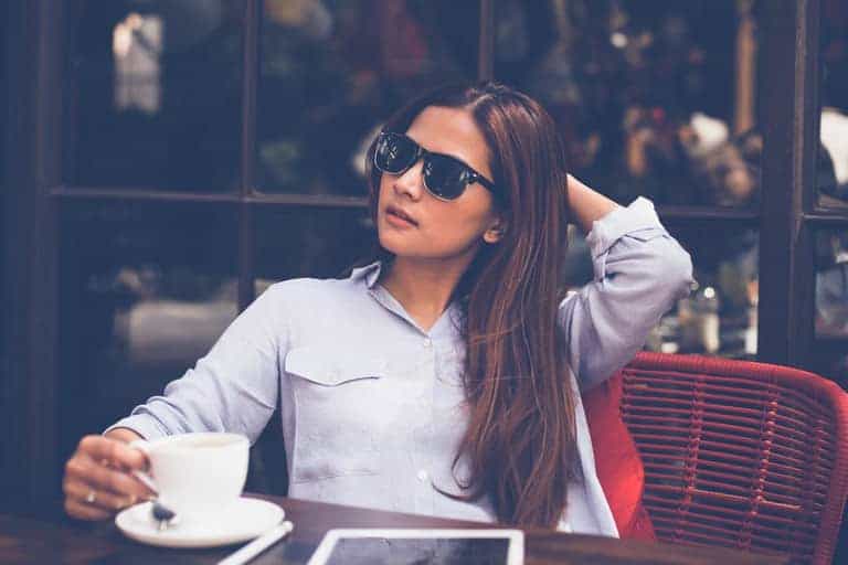 Young woman drinking coffee