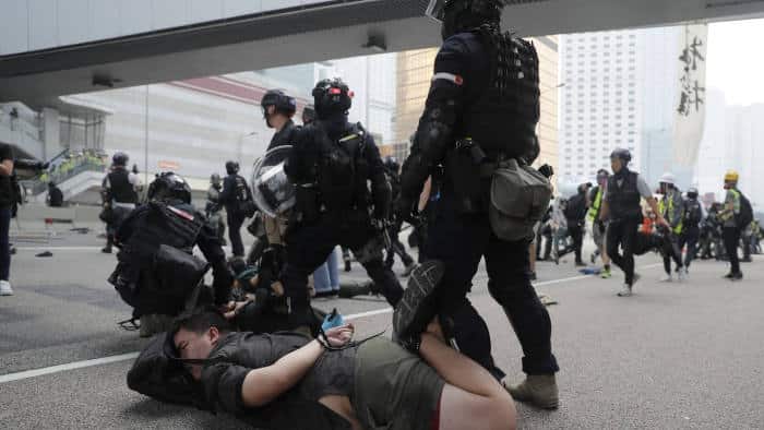 TT Trump cong bo hanh dong dap tra chua tung co voi Trung Quoc hinh anh 2 Hong_Kong_AFP.jpg
