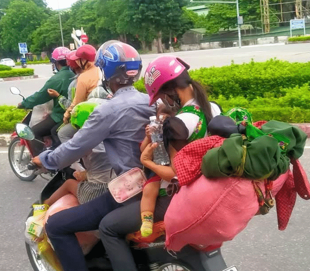  Hành trình 1400 km chạy xe máy từ miền Nam về quê của những người lao động nghèo tha hương - Ảnh 4.