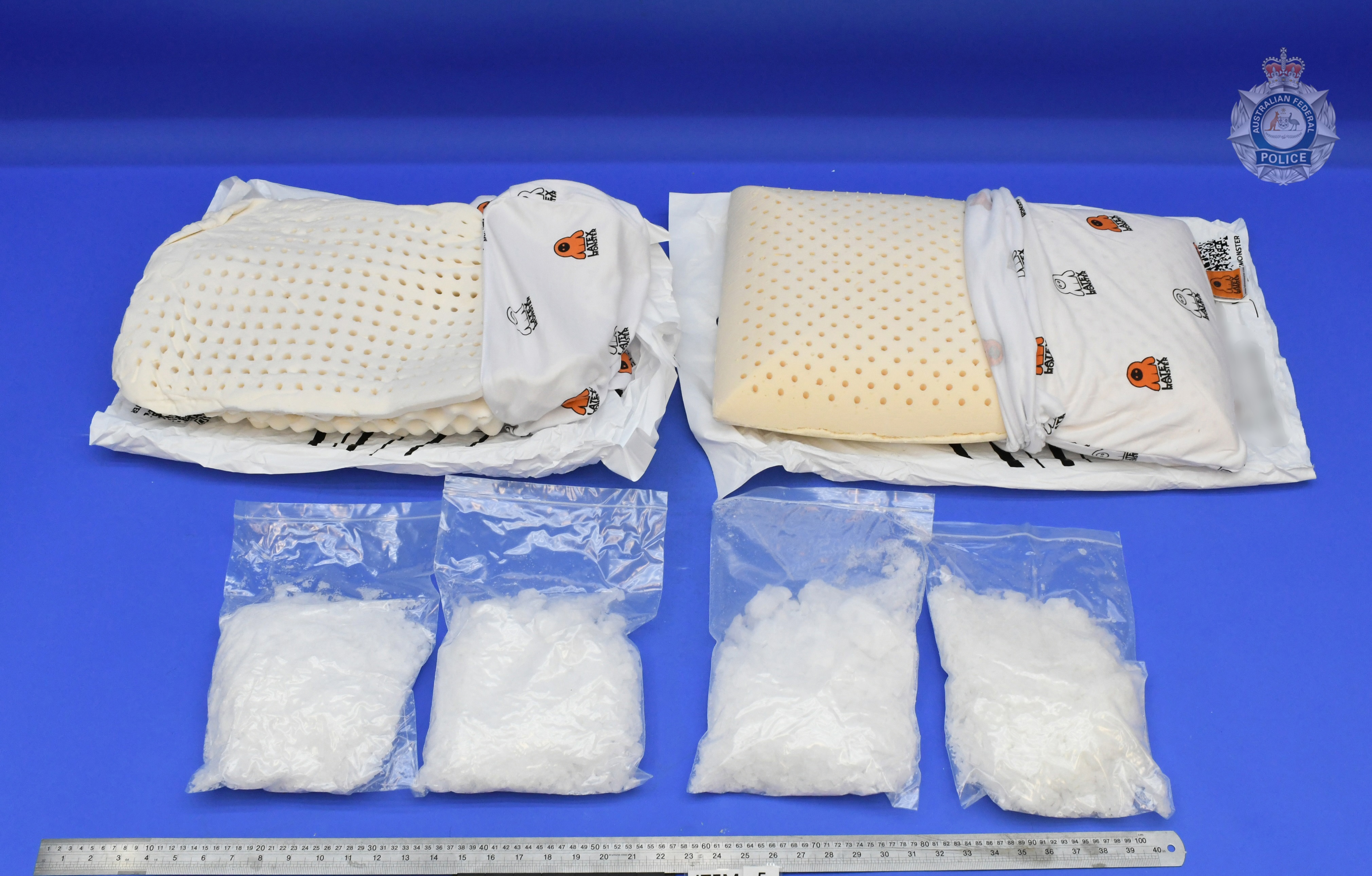 Ninety-nine kilograms of meth was hidden in a 550-kilogram shipment of latex bed pillows.