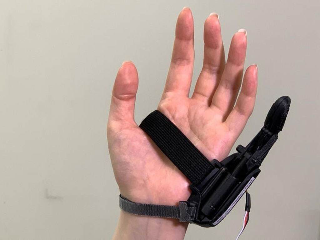 Nhật Bản chế tạo robot ngón tay thứ sáu - ảnh 1