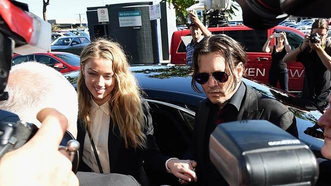 Amber Heard bi dieu tra anh 2